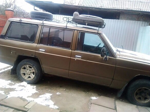 1988 Nissan Patrol III (K160, K260), коричневый, 270000 рублей - вид 1