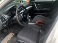 2010 BMW 1 серии 116i I (E81/E82/E87/E88) Рестайлинг, белый, 700000 рублей - вид 3