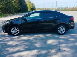 2013 Toyota Corolla XI (E160, E170, E180), чёрный, 1350000 рублей, вид 5