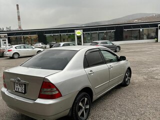 2001 Toyota Corolla IX (E120, E130), серый, 410000 рублей, вид 5
