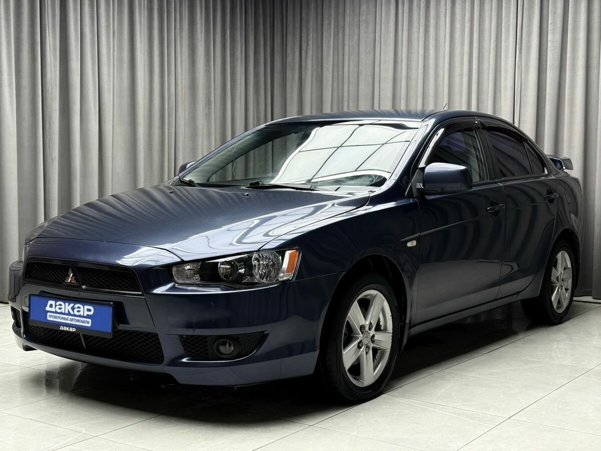 Открыть фотографии: Mitsubishi Lancer X
