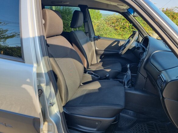 2018 Chevrolet Niva I Рестайлинг, серебристый, 750000 рублей - вид 8