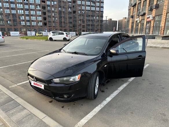 2010 Mitsubishi Lancer X, чёрный, 720000 рублей