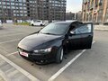 2010 Mitsubishi Lancer X, чёрный, 720000 рублей