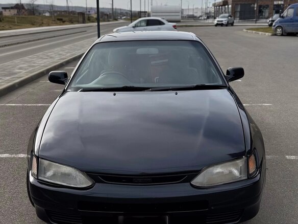 1991 Toyota Corolla VII (E100), чёрный, 500000 рублей - вид 4