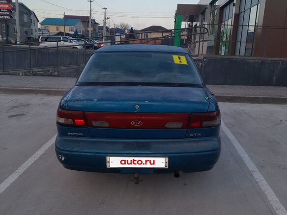 1997 Kia Sephia I Рестайлинг, синий, 99000 рублей - вид 4
