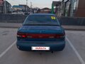 1997 Kia Sephia I Рестайлинг, синий, 99000 рублей - вид 4