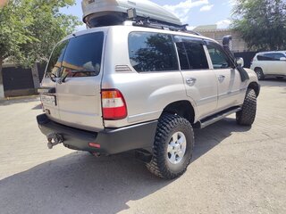 2003 Toyota Land Cruiser 105 100 Series Рестайлинг 1, серебристый, 2400000 рублей, вид 4
