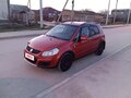 2011 Suzuki SX4 I (Classic) Рестайлинг, оранжевый, 750000 рублей - вид 1