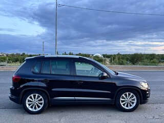 2011 Volkswagen Tiguan I Рестайлинг, чёрный, 1490000 рублей, вид 4