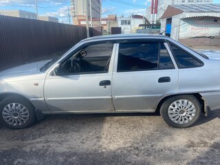 2013 Daewoo Nexia I Рестайлинг, серебристый, 150000 рублей, вид 4
