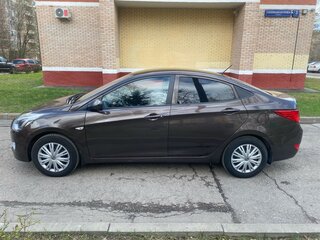 2016 Hyundai Solaris I Рестайлинг, коричневый, 900000 рублей, вид 4