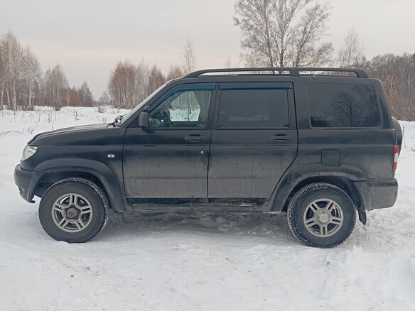 2011 УАЗ Патриот 3163 I, чёрный, 700000 рублей - вид 4