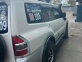 2000 Mitsubishi Montero III, белый, 1350000 рублей - вид 4