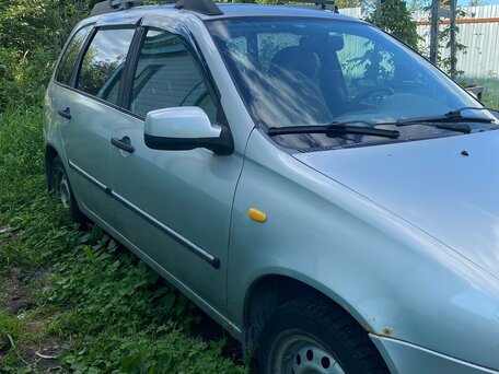 2010 Lada (ВАЗ) Kalina I, серебристый, вид 3