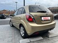 2011 Kia Rio II Рестайлинг, бежевый - вид 4
