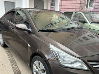 2014 Hyundai Solaris I Рестайлинг, коричневый, 680000 рублей, вид 2