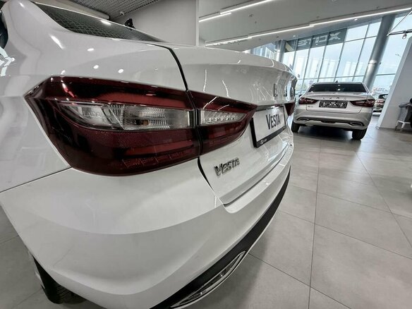 2026 Lada (ВАЗ) Vesta I Рестайлинг (NG), белый, 1669835 рублей - вид 14