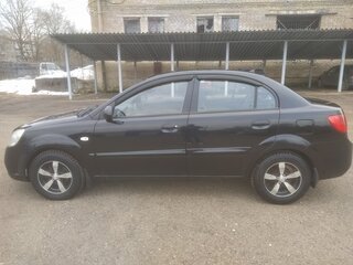 2011 Kia Rio II Рестайлинг, чёрный, 550000 рублей, вид 4