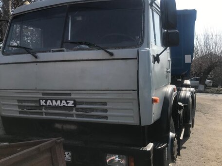 2005 КамАЗ 54115, серебристый, 2100000 рублей, вид 1