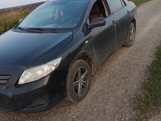 2010 Toyota Corolla X (E140, E150), чёрный, 450000 рублей, вид 1