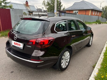 2014 Opel Astra J Рестайлинг, коричневый, 735000 рублей, вид 3
