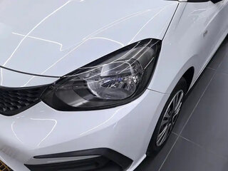 2023 Honda Fit Crosstar IV Рестайлинг, белый, 1150077 рублей, вид 3