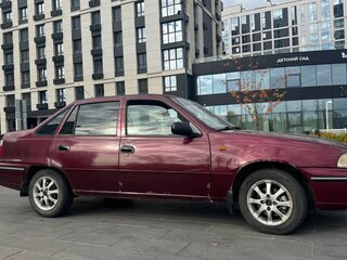 2005 Daewoo Nexia I, пурпурный, 94000 рублей, вид 2