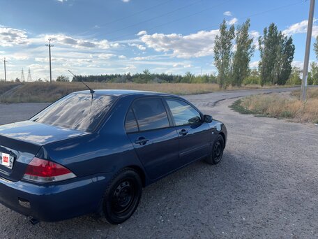 2005 Mitsubishi Lancer IX Рестайлинг, синий, 320000 рублей, вид 3