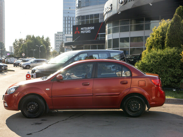 2010 Kia Rio II Рестайлинг, красный - вид 6