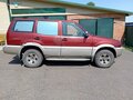 1996 Nissan Mistral, пурпурный, 230000 рублей - вид 1