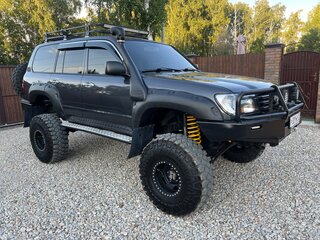 2004 Toyota Land Cruiser 105 100 Series Рестайлинг 1, серый, 4500000 рублей, вид 2