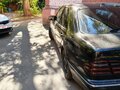 2001 Mercedes-Benz E-Класс 240 II (W210, S210) Рестайлинг, чёрный - вид 2