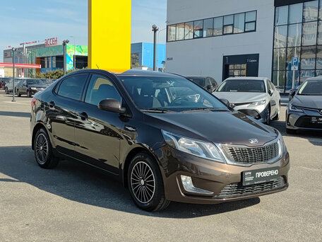 2014 Kia Rio 6-speed III, коричневый, 825000 рублей, вид 3