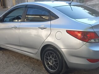 2012 Hyundai Solaris I, серебристый, 580000 рублей, вид 4