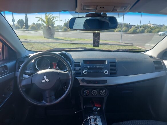 2011 Mitsubishi Lancer X Рестайлинг, красный, 650000 рублей - вид 12