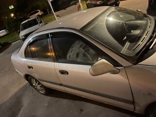 2002 Mitsubishi Carisma I Рестайлинг, серебристый, 150000 рублей, вид 3