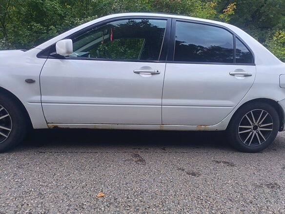 2003 Mitsubishi Lancer Cedia IX, белый, 350000 рублей - вид 18