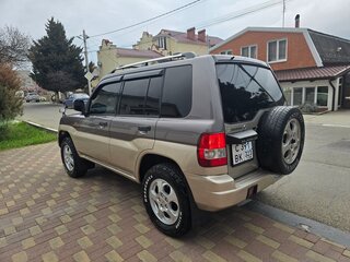 1998 Mitsubishi Pajero iO, коричневый, 649000 рублей, вид 5