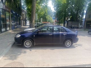 2004 Toyota Corolla IX (E120, E130) Рестайлинг, синий, 550000 рублей, вид 3