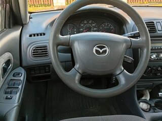 2000 Mazda Protege III (BJ), серебристый, 245000 рублей, вид 3