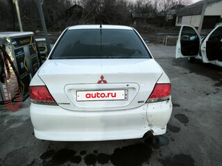 2005 Mitsubishi Lancer IX Рестайлинг, белый, 260000 рублей, вид 4