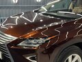 2017 Lexus RX 200t IV, коричневый, 4300000 рублей - вид 4