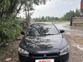 2008 Mitsubishi Lancer X, чёрный, 540000 рублей - вид 2