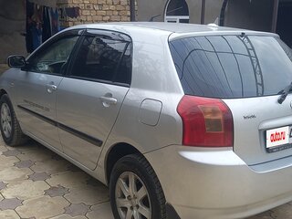 2003 Toyota Corolla IX (E120, E130) Рестайлинг, серебристый, 570000 рублей, вид 5