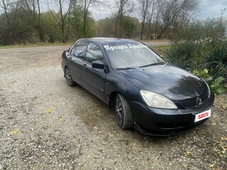 2009 Mitsubishi Lancer Classic IX Рестайлинг, чёрный, 450000 рублей, вид 2