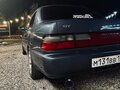 1992 Toyota Corolla VII (E100), синий - вид 10