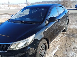 2015 Kia Rio III Рестайлинг, чёрный, 840000 рублей, вид 1