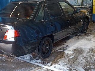 2011 Daewoo Nexia I Рестайлинг, чёрный, 289000 рублей, вид 1