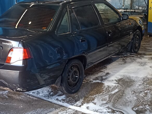 2011 Daewoo Nexia I Рестайлинг, чёрный, 289000 рублей